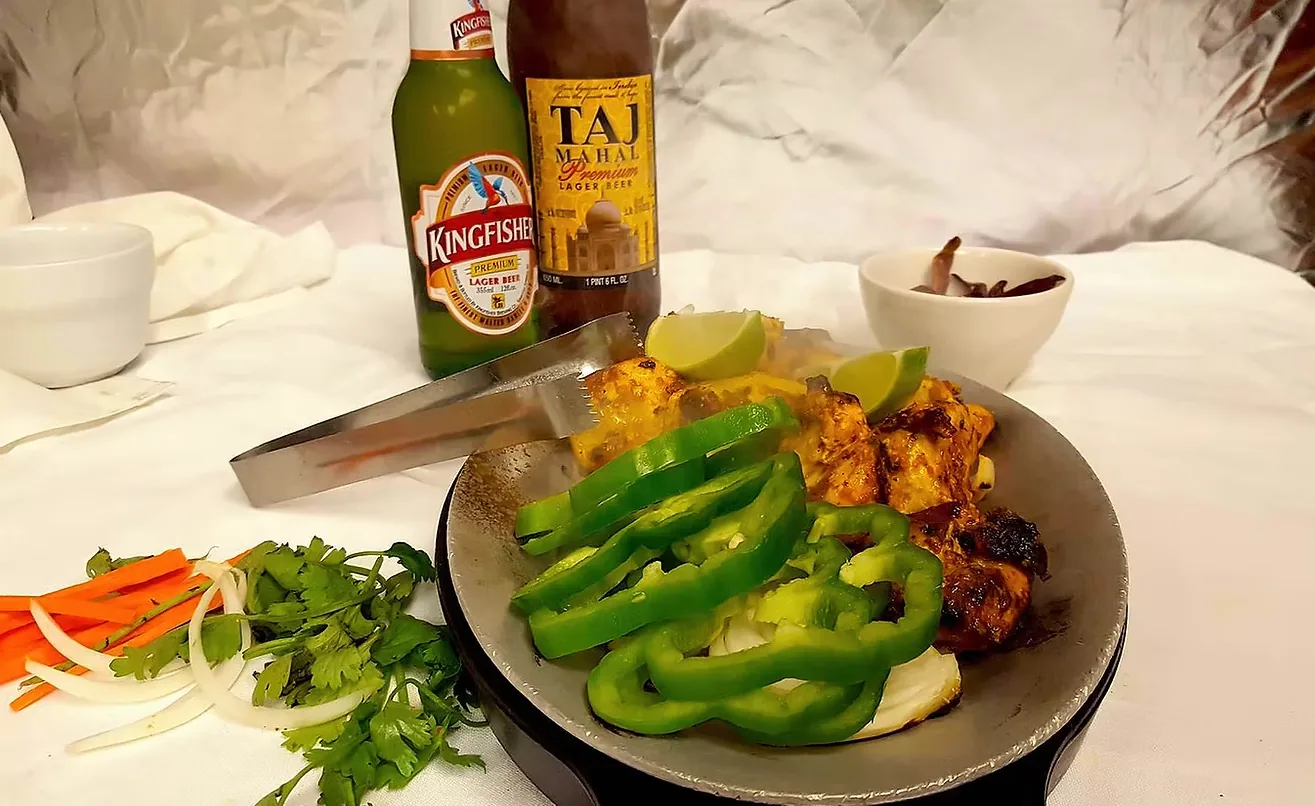 Tandoori dish served with drinks