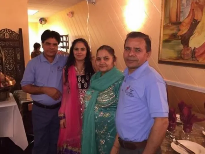 Restaurant family and staff portrait