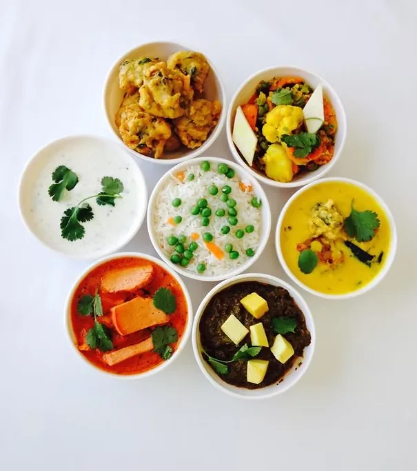 Assortment of Indian dishes served in bowls